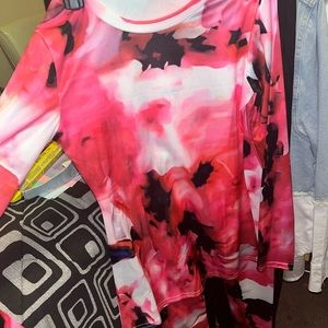 Item has never been worn. Very little stretch. The colors are very vibrant!